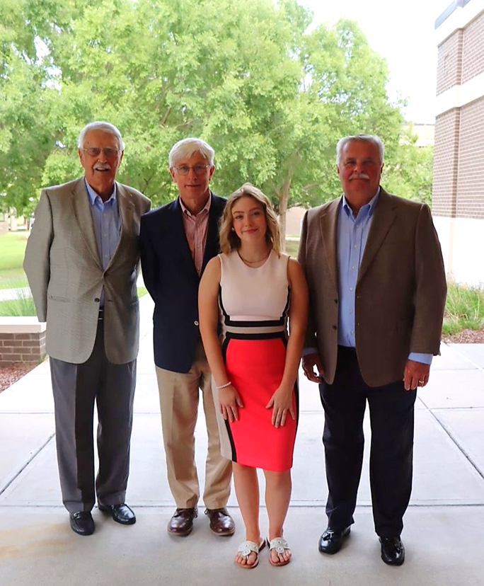 (From left) Hill poses with SCC Board of Trustees members Pat Jones, Dr. Paul Viser, and Chris Fann during her appointment and their reappointment to the board. (Photo credit/ Brett Feight)