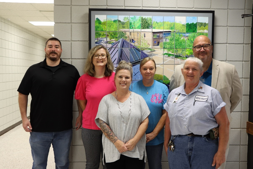 10 years of service: Jason Frazier, Shelley Ryals, and Loreen Hudson pictured with Dr. Bill Starling, (Front left) Sharon West, and Myra Gray.