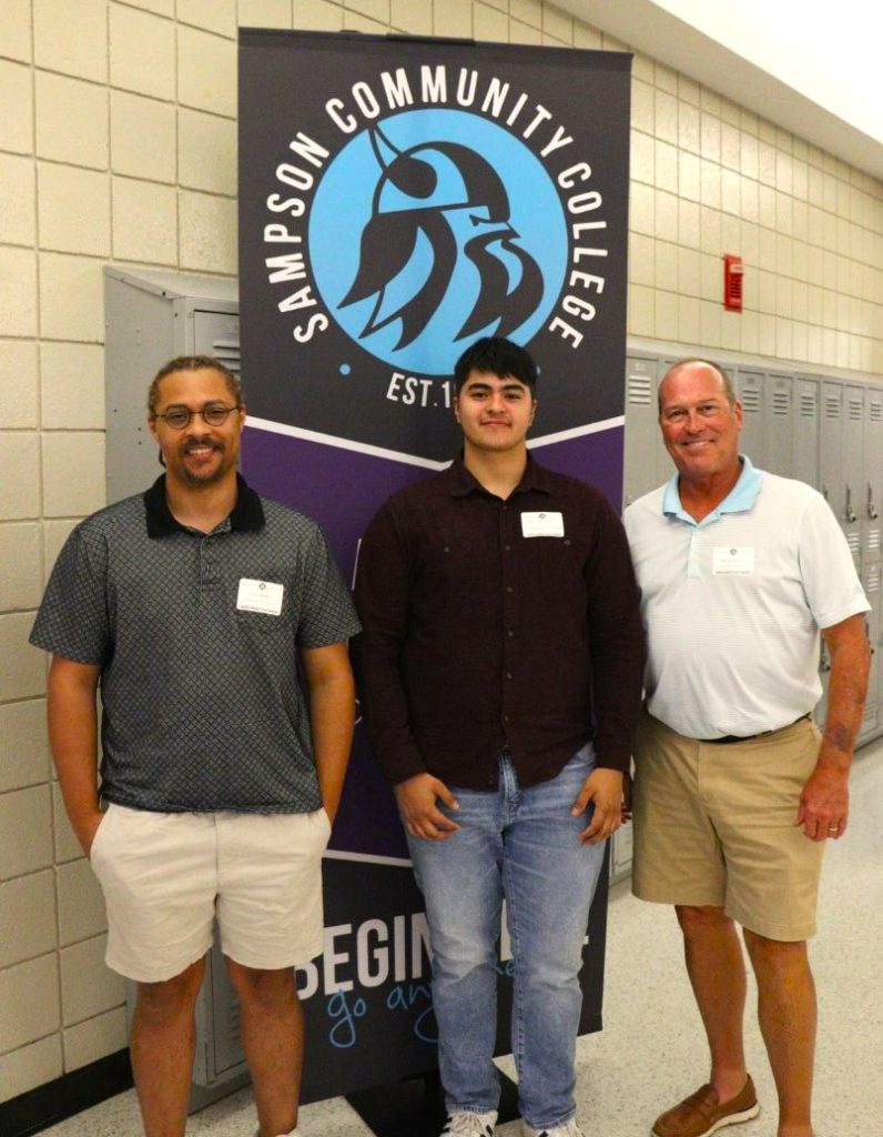 McKoy and Ibarra celebrate their Ambassador Scholarship award at the College’s 2022 Scholar-Donor Picnic, pictured with Brooks Barwick of the Foundation.