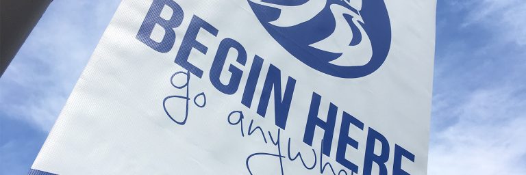 Photo of the Begin Here banner