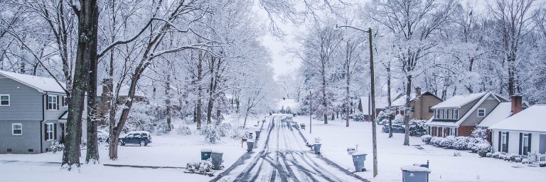Photo of snowy neighborhood.